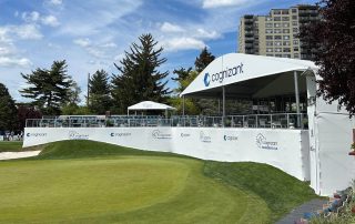 custom branded golf tournament structures on elevated flooring