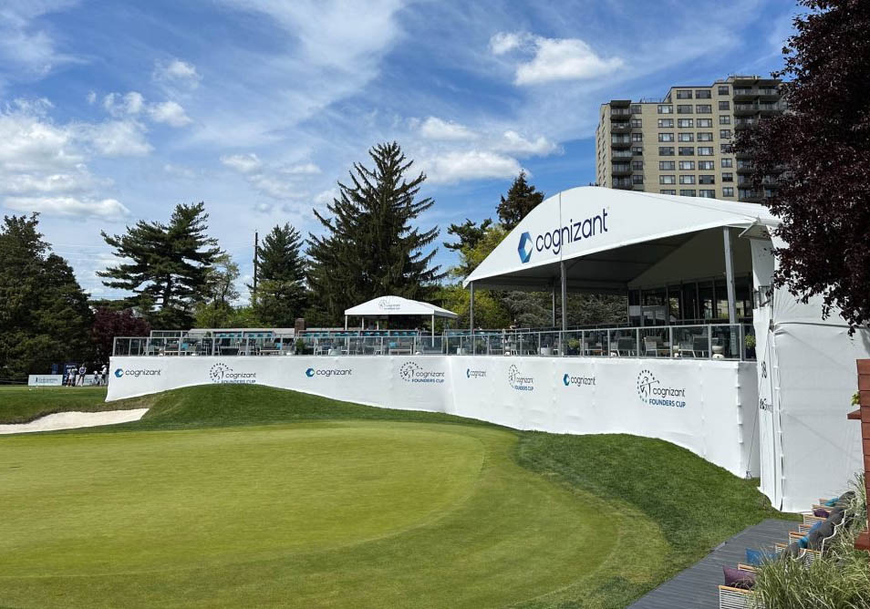 golf tournament structure on elevated flooring with custom gable graphics